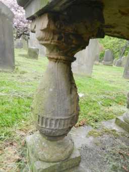 Oblique view of detail on front left leg of Grey Tomb at St Margaret, Tanfield May 2016